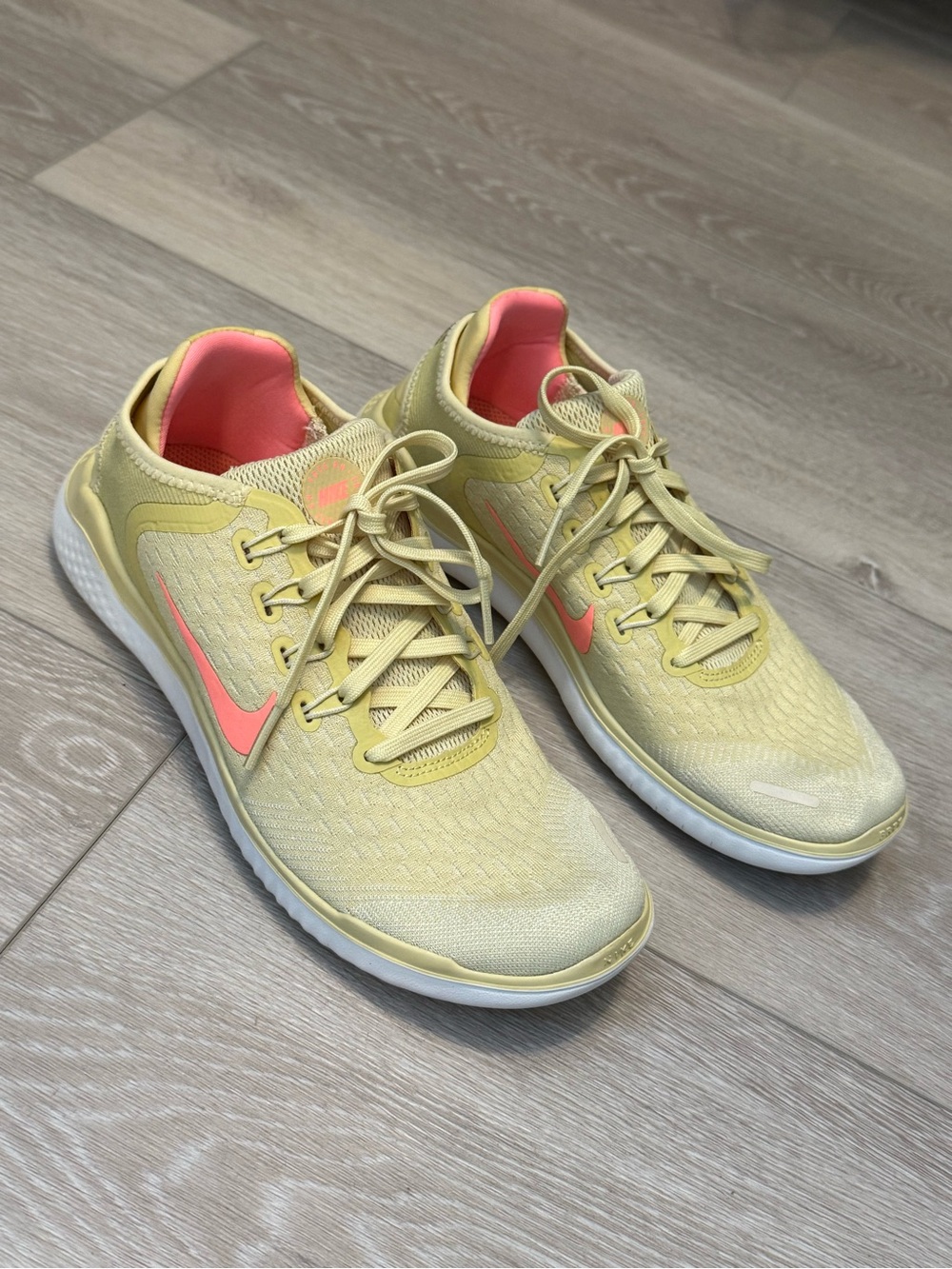 Nike Women's Yellow Sneakers with Pink Swoosh